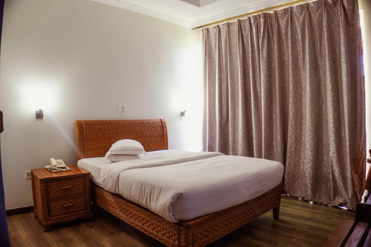 Tanga Beach Resort & Spa Buitenkant foto